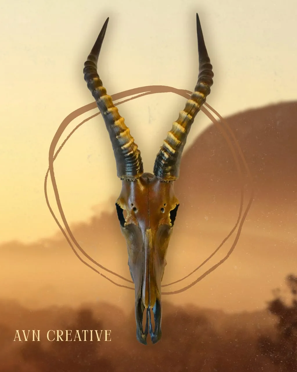Antelope skull with long ridged horns, hand-painted against a warm sunset-toned backdrop
