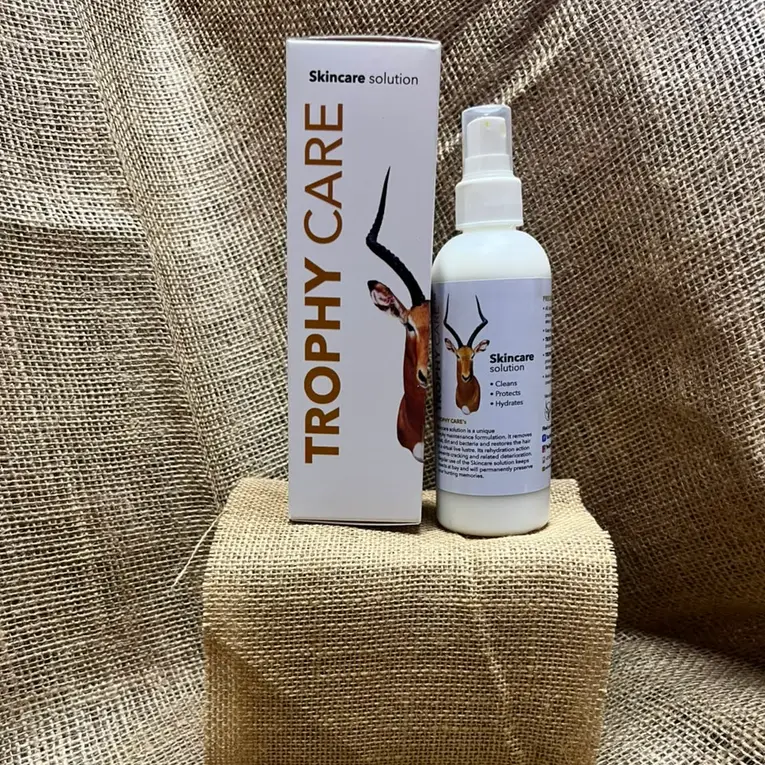 Trophy Care Skincare Solution 200ml bottle and carton on hessian